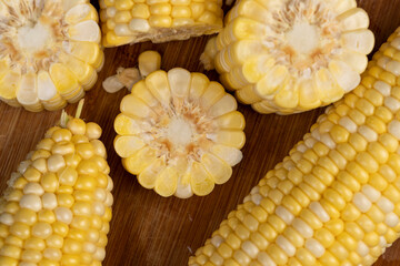 pieces of sweet corn for cooking and cooking with juicy yellow grains
