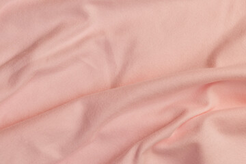 details of a part of the pink fabric that is used to make clothes