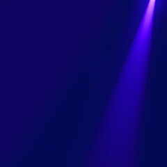 a purple stage with a blue light on it