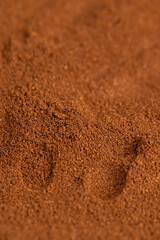 a large amount of ground coffee powder close-up