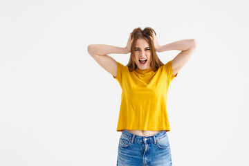 Worried young woman with hair loss problem isolated on white background