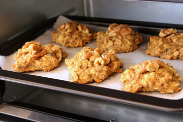 Homemade oat and banana cookies in the oven, dessert for vegan