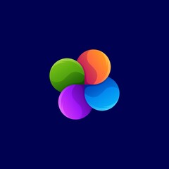 A colorful design of four different colored spheres