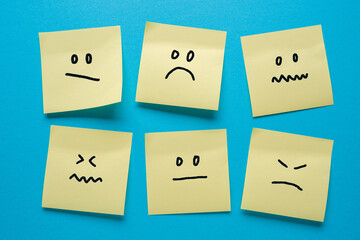 Post-it or Sticky Notes with different sad and angry emotions