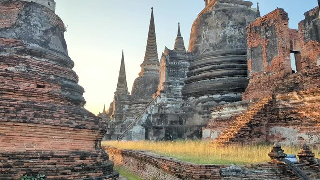 Sunset at Wat Phra Si Sanphet Temple, Ayutthaya, Thailand. The beautiful ancient,pointed chedi structures,standing on the site of the old Royal Palace, in Thailand's holiest  former capital.