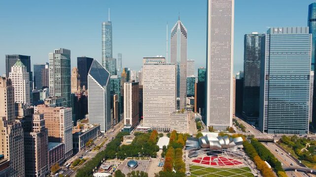 Downtown Chicago skyline with Millennium Park landmarks. Aerial view of Chicago's downtown skyline showcasing Millennium Park with its famous landmarks, including the Cloud Gate sculpture and Pritzker