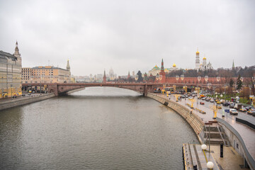 Fototapeta premium The Moskva River flows through the heart of Moscow, Russia's capital city, on the right stands the Kremlin, a symbol of authority