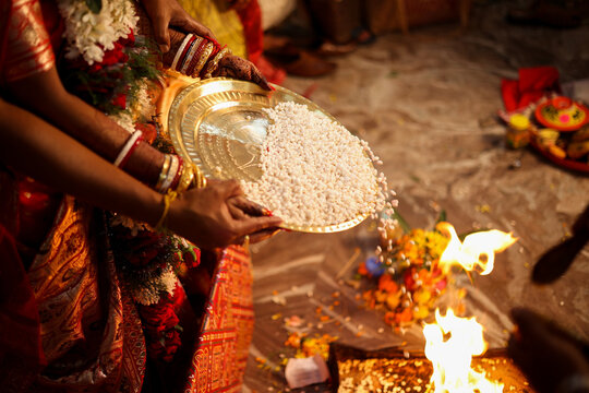 Bengali wedding ritual Khoi Daan