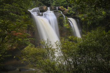 Fototapeta premium Haew Suwat Waterfall is a single-tiered waterfall, not very large, about 25 meters high, with a lot of water during the rainy season. It is located in Khao Yai National Park, Korat.