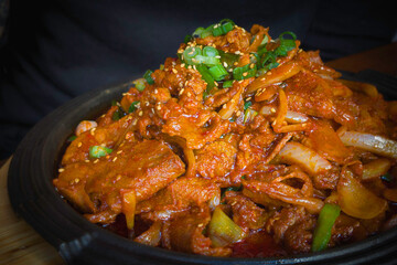 Korean Spicy Pork Dish, aka Jeyuk Bokkeum, Served on the Hot Metal Plate