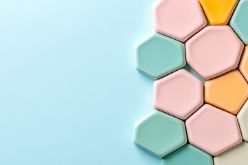 A flat, abstract representation of a hexagonal honeycomb pattern, featuring soft pastel tones and crisp lines