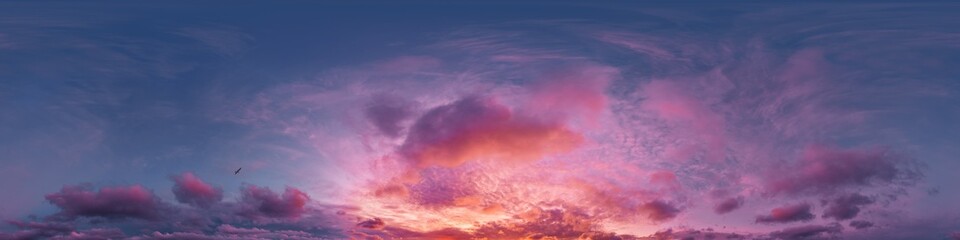 360 panorama of glowing sunset sky with bright pink Cumulus clouds. HDR 360 seamless spherical panorama. Full zenith or sky dome sky replacement for aerial drone panoramas. Climate and weather change.