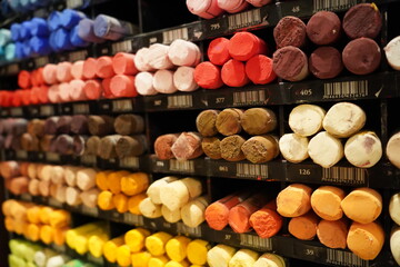 collection of multicolored oil pastels on display