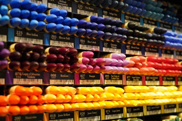 collection of multicolored oil pastels on display