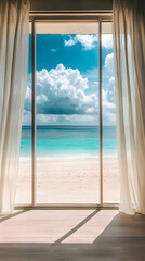 A serene beach view through a large window with flowing curtains and a bright sky.