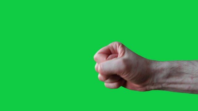 Rock-paper-scissors game by adult male hand, male hand showing two fingers, palm and fist, Hand game, isolated gesture by man hand on green chromakey background, Paired hand game