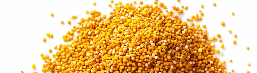 Golden Grains, A Pile of Small, Round, Yellow and White Food Items Scattered on White Background