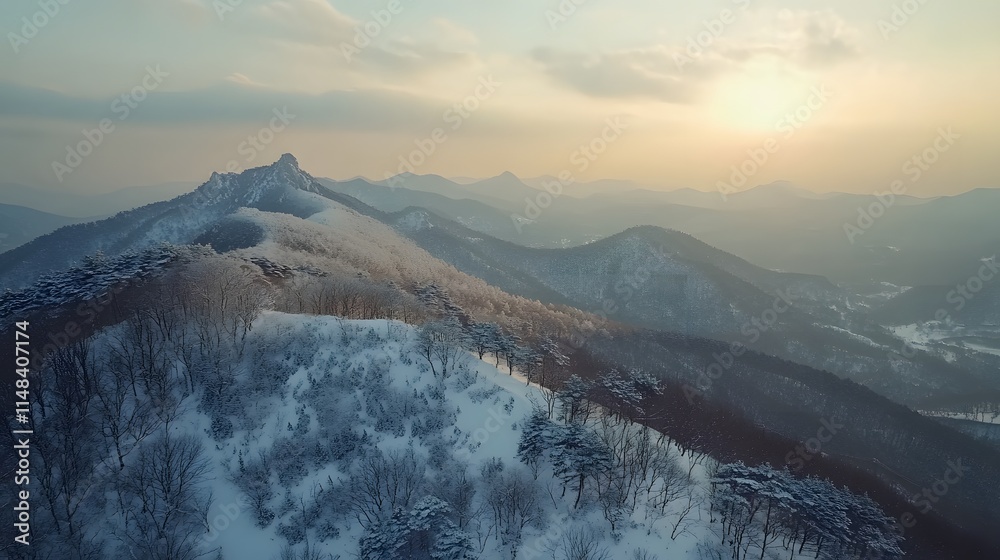 Poster aerial shot of the serene taebaek mountain range covered in fresh snow, with soft light creating a p
