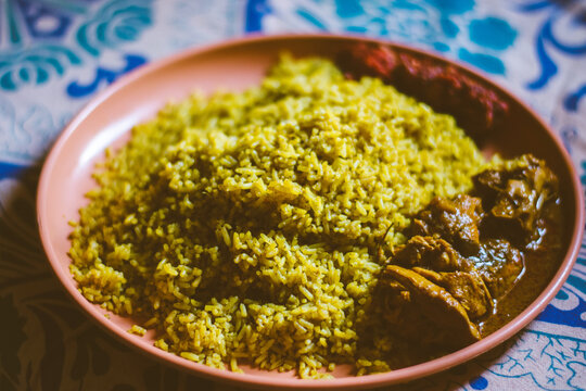 Chicken Donne Biriyani recipe is a local hit popular in eateries and restaurants around Bangalore. The word 'Donne' means cups that are made using dried plantain leaves.