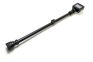 Obraz premium Photo and video lightweight black action camera with selfie stick on white background.
