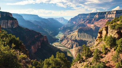 Panoramic view of a vast canyon with a winding river at the bottom, surrounded by layered rock formations and lush greenery.