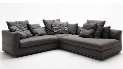 Obraz premium Modern gray sectional sofa with plush cushions, perfect for contemporary living spaces.