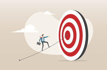 businessman walking on the line aiming at target bullseye