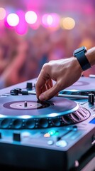 Obraz premium DJ at the turntables in a lively disco club, colorful lighting and a crowd dancing in the background
