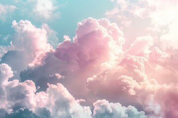 Beautiful pink and white cloudscape illuminating blue sky