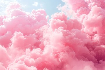 Fototapeta premium Pink cloudscape filling the sky with pastel hues and sunlight