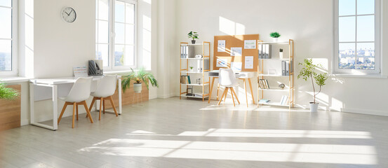Bright, empty office, workplace or meeting room illuminated by daylight. The clean and modern space...
