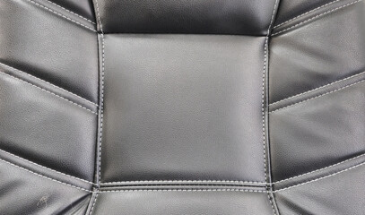
black leather background. 
Black leather close-up. 
Place for text