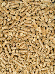 Natural wooden pellets. Pellet fuels, renewable energy, compressed organic material