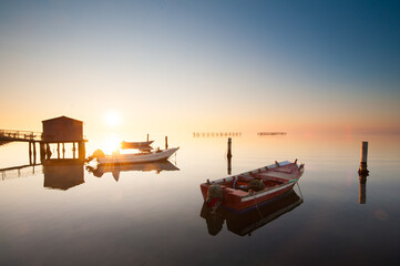 Sunset in Sacca di Scardovari. Porto Rolle, Rovigo, Veneto, Italy, Europe.