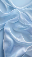 Obraz premium A soft, flowing light blue fabric creates an elegant, serene texture.