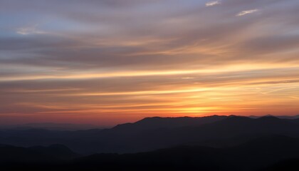 Fototapeta premium Majestic Sunrise Over Serene Mountain Range