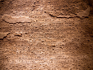 Hieroglyphs carved into the walls inside the Great Temple of Ramesses II, Abu Simbel, Egypt