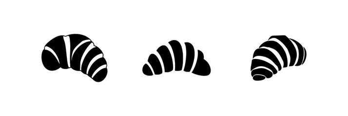 Three stylized black and white croissants with curved lines.