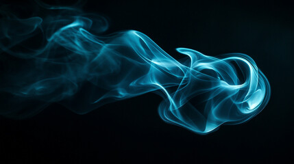 Fototapeta premium Gentle blue smoke swirling in dark background creates mesmerizing patterns.