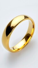 Wedding gold ring isolated on a white background close up