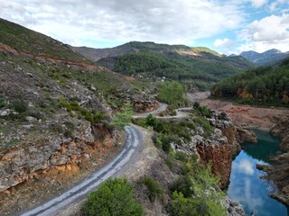 reservoir rocky shore autumn trees 
