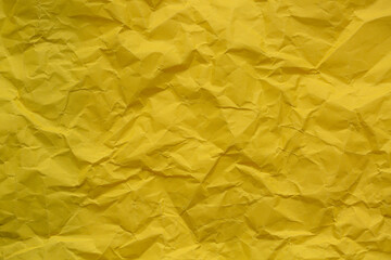 Close-up of yellow crumpled paper texture,Yellow Crumpled Paper Background.