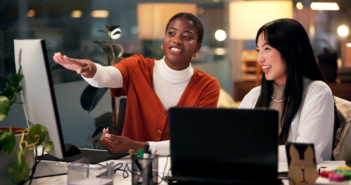 Teamwork, computer and coaching with business people in office for tech startup, web design or blog post overtime. Homepage developer, collaboration and deadline with women in digital agency at night - Powered by Adobe