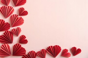 Obraz premium Red paper hearts on a pink background, Valentine's Day greeting card, love and romance, festive decoration, copy space