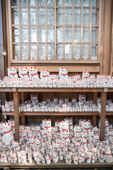 Japanese waving cat, lucky cat, fortune cat of temple in Tokyo, japan 