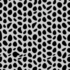 Obraz premium Black and White Pebble Seamless Pattern: A simple yet stylish design with black pebbles on a white background, perfect for adding a touch of natural elegance to any project. 