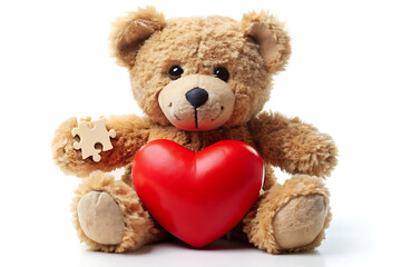 Obraz premium Charming Teddy Bear Holding a Unique Puzzle Heart On White Background