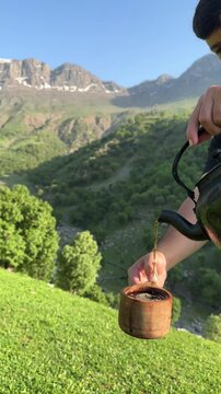 drinking tea in the mountains in the morning