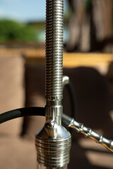 Obraz premium Hookah Details. Steel hookah. Charcoal bowl.