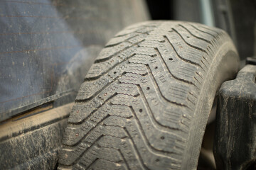 Car Spare Tire. Winter tires for car. Wheel on machine.